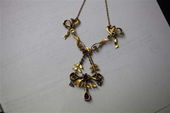 An Edwardian 9ct gold, amethyst and seed pearl drop necklace, 17.5in.